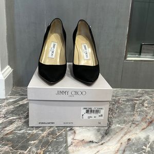 Jimmy Choo black satin pumps.